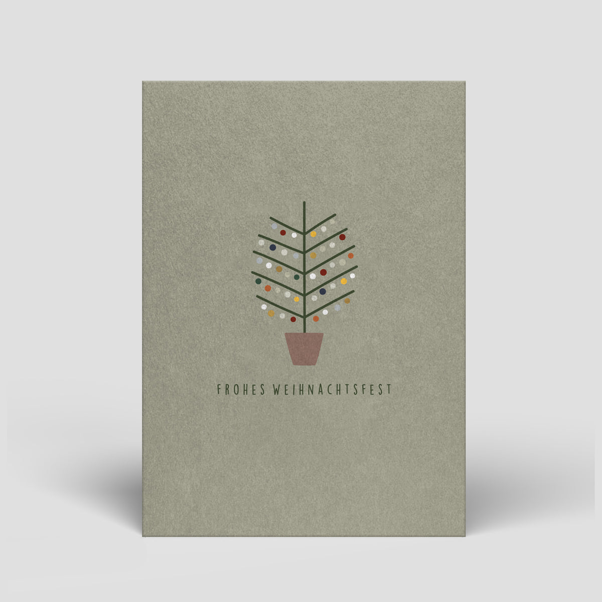 Weihnachtskarte mit grauem Cover: Tannenbaum mit Kugeln und Text „Frohes Weihnachtsfest“