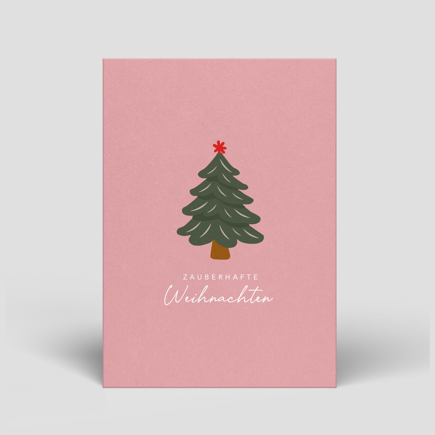 Rosa Weihnachts-Postkarte mit Tannenbaum und Schriftzug „Zauberhafte Weihnachten“
