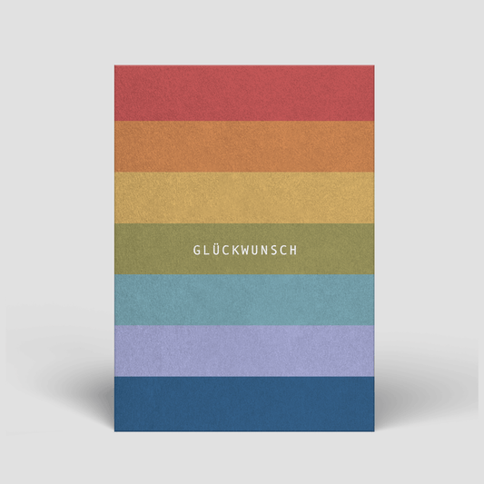 Geburtstagskarte mit Regenbogenstreifen und Aufdruck „GLÜCKWUNSCH“