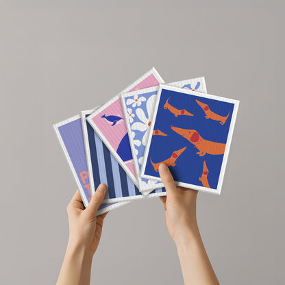 Schwammtuch-Set mit Dackelmotiven, mehrere Quadrate in Blau und Pink