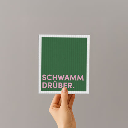 Schwammtuch mit grünem Motiv und rosa Schrift „SCHWAMM DRÜBER.“