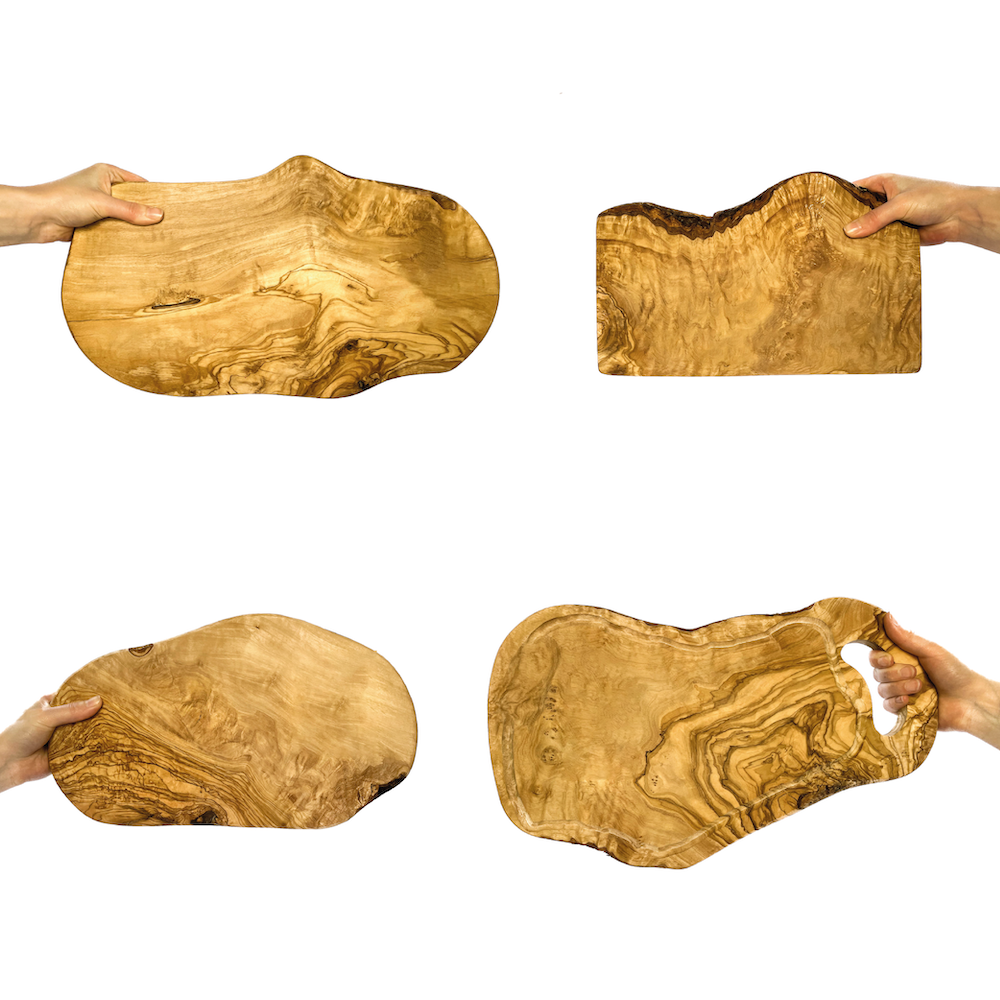 Vier verschieden geformte personalisierbare Schneidebretter aus Olivenholz auf einem weißen Hintergrund. Oval, rechteckig und mit Griff und Saftrille.