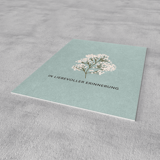 Trauerpostkarte mintfarben, Blütenbaum-Motiv mit Text „IN LIEBEVOLLER ERINNERUNG“